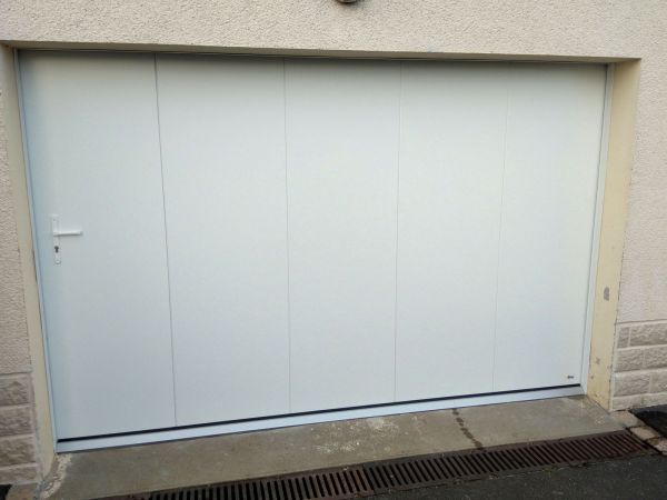 installation-pose-portes-garage-coulissantes-menuiserie-marionneau-vallet-4419305048-AD39-CD3D-069E-85A06C410E04.jpg